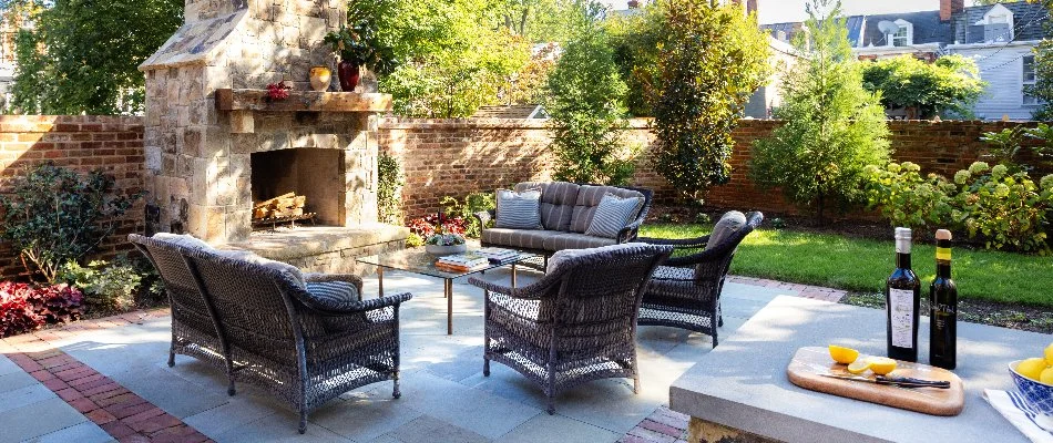 An outdoor fireplace on a patio in Chevy Chase, MD.