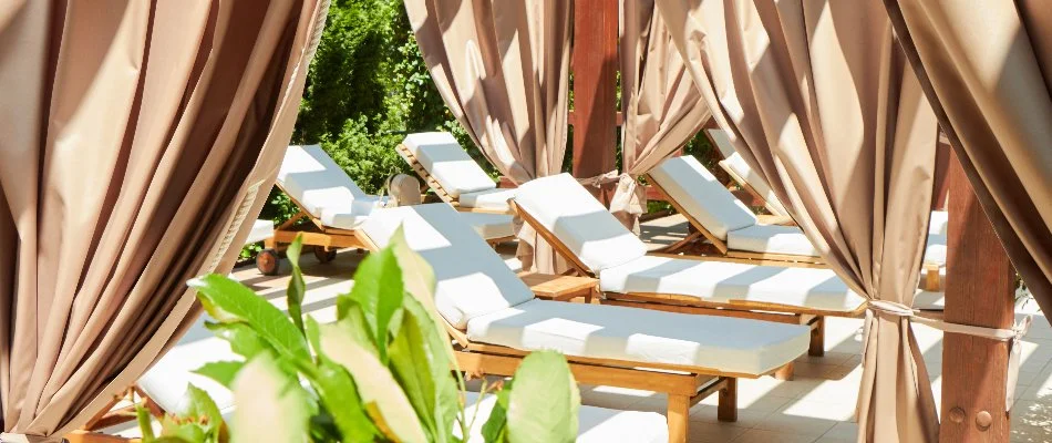 Large, peach-colored cabana near pool in Chevy Chase, MD.