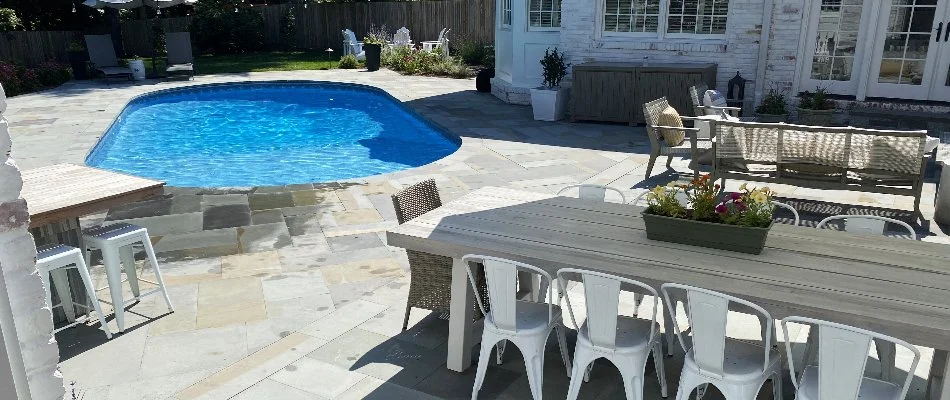 Pool area with table and chairs in McLean, VA.