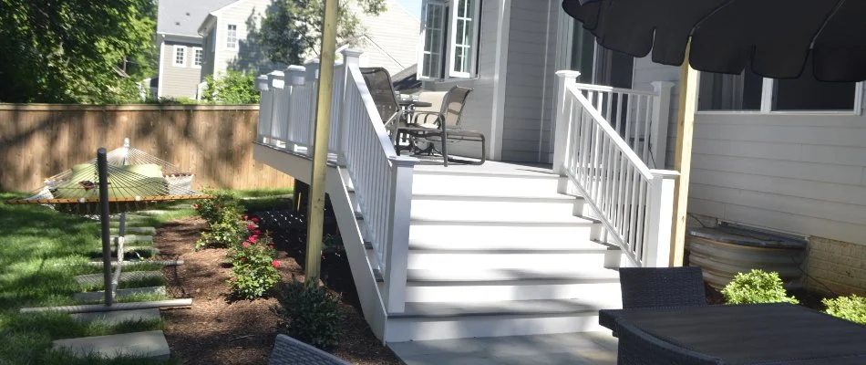White outdoor steps leading to patio area in Chevy Chase, MD.