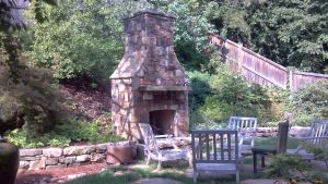 Landscape Design Clarksville Outdoor Stone Fireplace With Cool Chairs